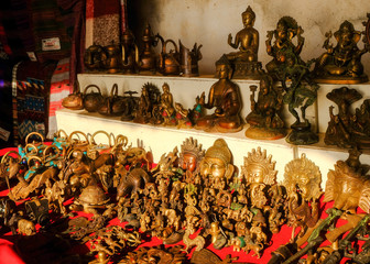 Traditional Indian statues and souvenirs on the market in Arambol, Goa, India.