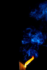 Match, smoke and flame