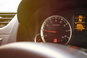Closeup Tachometer Gauge on Dashboard in The Car