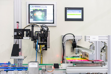 high technology vision measuring or inspection machine connect or communication with sorter device unit equipment for quality control product  in manufacturing at production line © Surasak