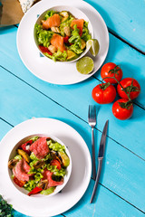salad on a wooden blue table.