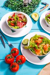 salad on a wooden blue table.