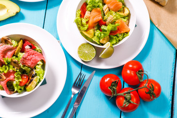 salad on a wooden blue table.