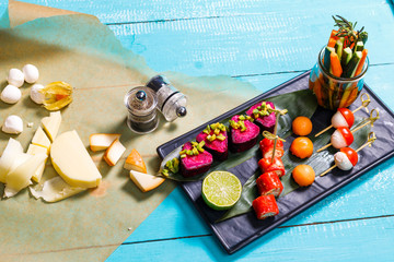 Catering. Away the food. snacks on blue wooden background. the view from the top