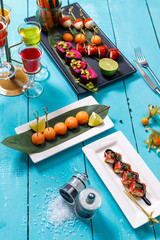 Catering. Away the food. snacks on blue wooden background. the view from the top