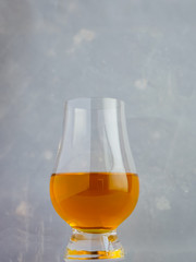 Irish Whiskey Glass Textured Paper Background Portrait Medium Shot