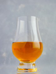 Irish Whiskey Glass Textured Paper Background Portrait Extreme Close Up