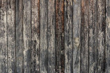 Old wooden background of boards with cracked paint