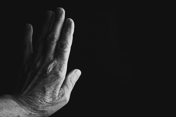 Mother's cautionary hand black and white photo