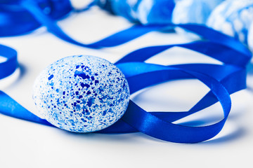 blue Easter eggs isolated on white.