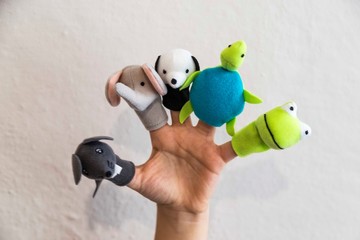 Funny animals puppets in the fingers. Children's activities concept.Happy teachers day 