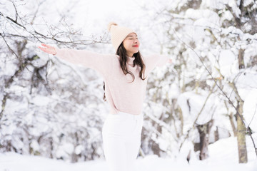 Fototapeta na wymiar Portrait Young Beautiful asian woman smile happy travel and enjoy with snow winter season