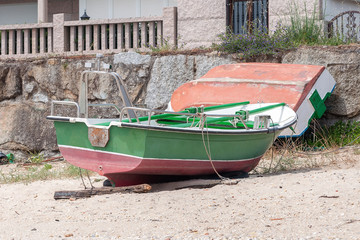 Fototapeta na wymiar wooden fishing boat anchored