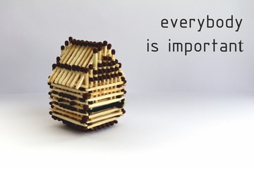 everyone is important in this world. House of matches, the architecture of matches. Slogan and motivation. Banner with motivational inscription. This can be done by everyone.