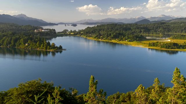 Lake district in Argentina, Patagonia near Bariloche. National park Nahuel Huapi, view from punto panoramico at sunset. Summer landscape with lakes, forest and mountains. 4K UHD