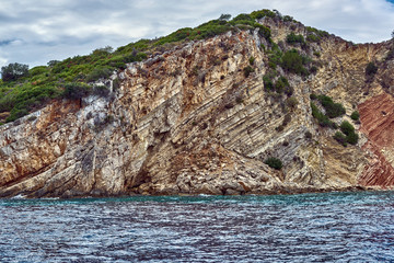 On a boat traveling alongside the coast of Ithake, Greece