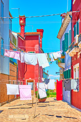 Street with drying linen in Burano