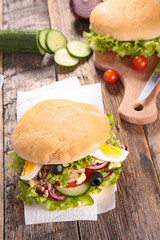 sandwich with tuna,egg,tomato and cucumber