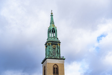 Fototapeta na wymiar St. Mary Church Berlin isolated on natural blue sky background, The St. Mary Church located on the Alexanderplatz in Berlin, Germany, 