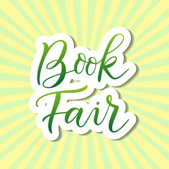 Fototapeta premium Modern calligraphy lettering of Book Fair in green with outline in paper cut style on background with rays for banner, poster, advertising, book festival, sale, book store, shop, invitation