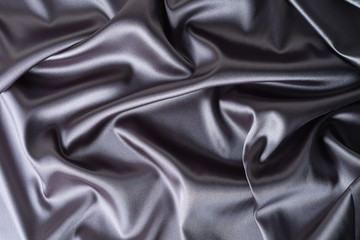 Obraz premium close-up view of piece of satin fabric. Minimal color still life photography