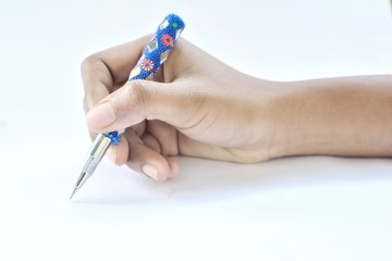 holding and writing with a pen