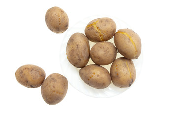 Boiled potatoes in a plate isolated on white background