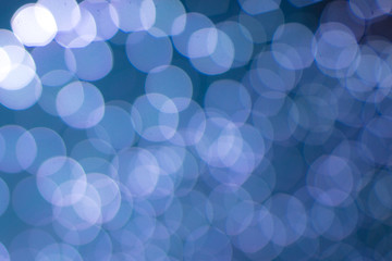 Blue bokeh of lanterns for christmas as a background