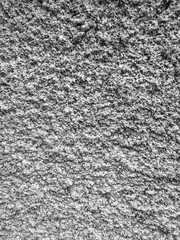 Gray plaster coat on the wall as a background