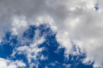 Clouds against blue sky as abstract background
