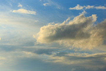 Clouds after rain before sunset as a background
