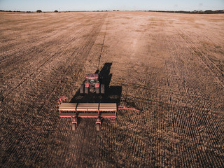 Tractor and seeder, direct sowing in the pampa, Argentina