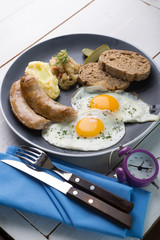 German breakfast on a grey plate