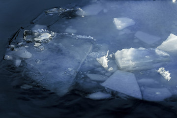 Winter landscape with blue ices