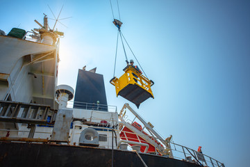 engineering, loading master connect to gantry crane driver by walkie talkie for lifting safety in...