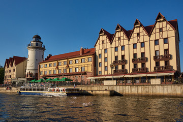 Fototapeta premium Russia. Kaliningrad. View of the Fish Village from the Jubilee Bridge of the Old Pregolya River