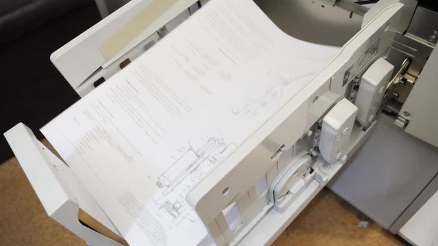 Detail of a modern digital printer of a copy center