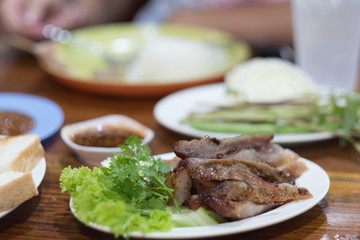 Tasty slice grilled beef on white dish