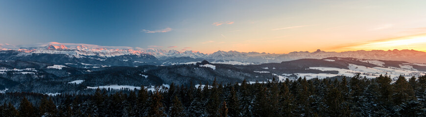 Fototapeta na wymiar panorama of winter sunset in the Bernese Alps