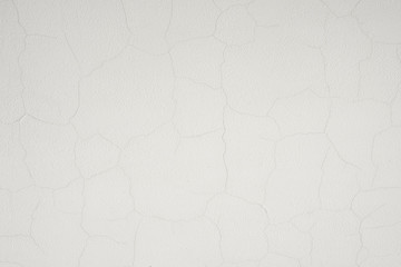 Plastered surface with cracks. Abstract background for design, banner and layout