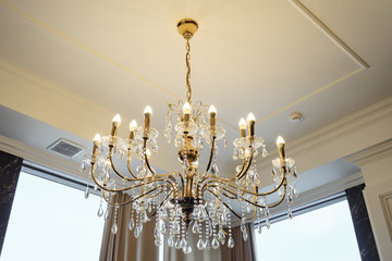 elegant chandelier on the ceiling in a luxury restaurant,.