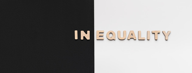 Word Inequality written on black and white background