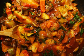 Vegetable stew or ratatouille in a cast iron skillet