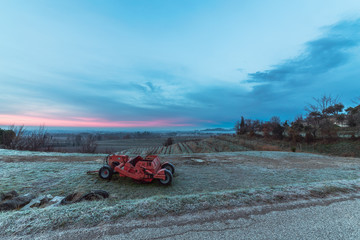 Cold misty morning in the vineyards of Italy