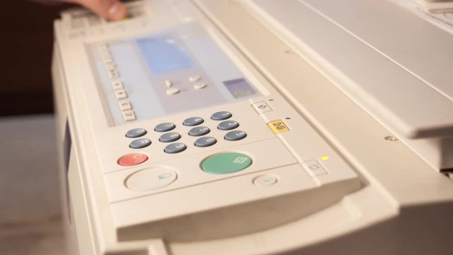 Detail of a modern digital printer of a copy center