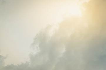 Sky background with clouds and sun grow.