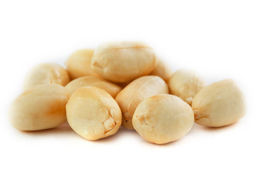 Roasted peanuts peeled and isolated on a white background