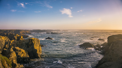 Sunset over a rough shoreline