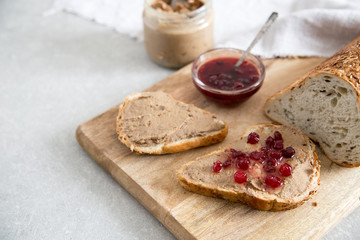 Fresh homemade chicken liver pate (rabbit, goose) with cranberry sauce. Toasted bread with pate