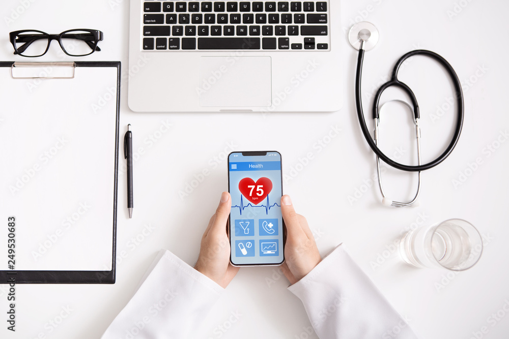 Poster doctor using smartphone app to check health data